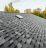 roof of new house with shingles roof-tiles and ventilation window roof of new house with shingles roof-tiles and ventilation window